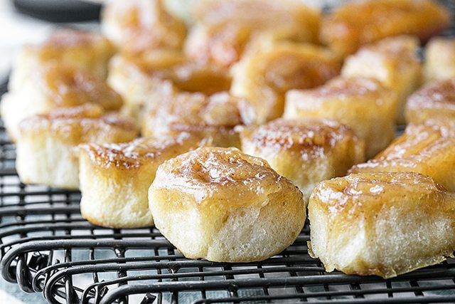 These Bite-Sized Cinnamon Buns require no yeast or kneading. Using crescent rolls, you'll have them ready to serve in minutes. Recipe at livelaughrowe.com