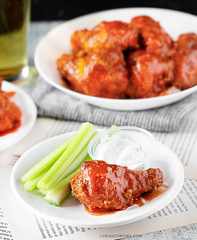 Plated Buffalo Chicken Wing with Celery and Sauce