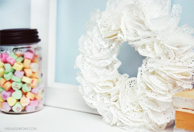 Sweet Valentine Vignette with a paper doily wreath. Absolutely darling! livelaughrowe.com