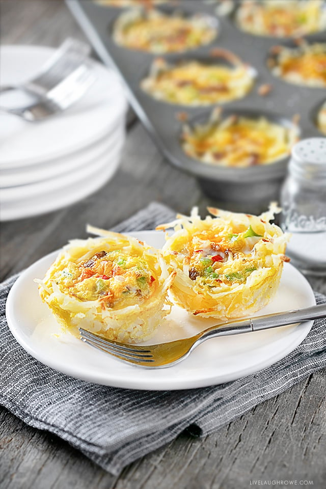 Two Individual Breakfast Frittatas on a plate with fork