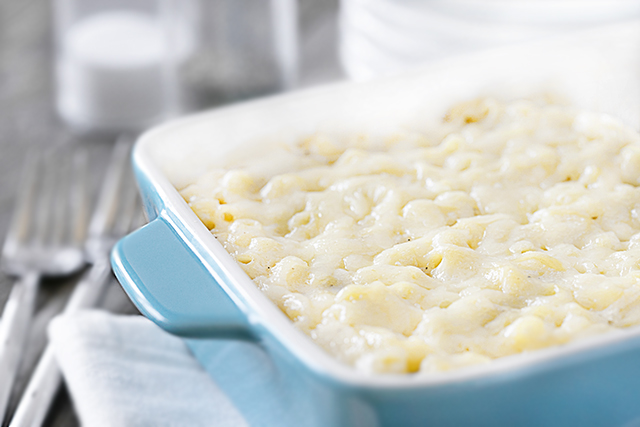 Dinner is served! This Baked Macaroni and Cheese is dangerously good. Delicious and simple -- your whole family will be begging for more. Recipe at livelaughrowe.com #dinner #macandcheese