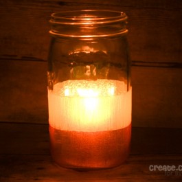 These Candy Corn Luminaries are the perfect addition to your fall or Halloween decor! via createcraftlove.com for livelaughrowe.com #fall #halloween #luminaries #candycorn
