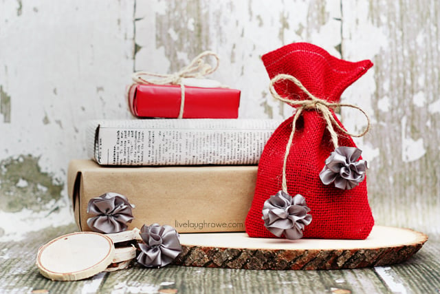 Use mini scrunchy bows to make festive and rustic gift ties. Tutorial at livelaughrowe.com