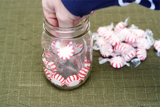 continue inserting peppermints between jar and votive holder