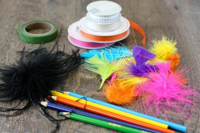 Supplies needed for Feather Topped Pencils. Great summer camp craft!
