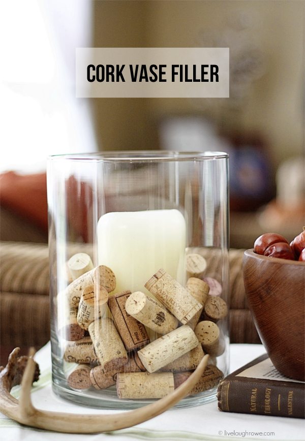 A simple and cost effective vase filler! Use your growing collection of corks as vase fillers... www.livelaughrowe.com #DIY
