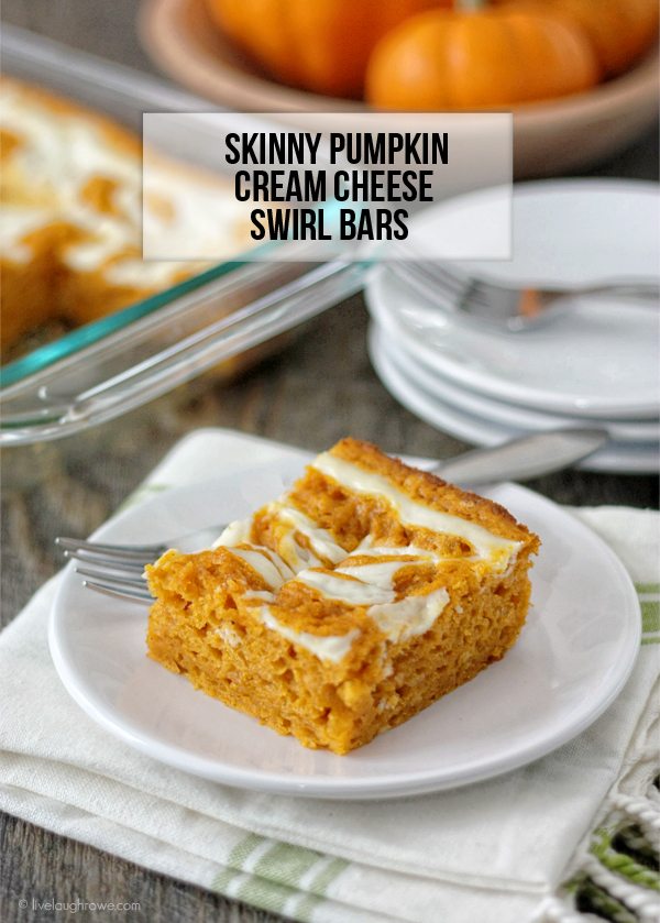 Skinny Pumpkin Cream Cheese Swirl Bars. Served warm, this recipe will have your taste buds doing a happy dance. www.livealaughrowe.com #dessert #pumpkin