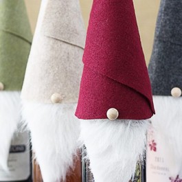 Tell me these Gnome Wine Toppers aren't the cutest things ever? Make one in 10 minutes. Great for the wine enthusiasts. www.livelaughrowe.com #gnome #winetoppers