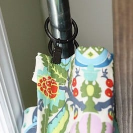 DIY Window Treatment for Sliding Glass Doors for less! These lined curtains are lovely and hung with curtain clips... tutorial at www.livelaughrowe.com