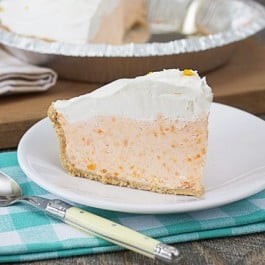 Seriously delicious! This Creamsicle Pie is a frozen treat that won't last long! Recipe at livelaughrowe.com #dessert #pie