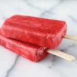 Raspberries and Cream Popsicles. The perfect frozen treat on a hot summer day! Recipe at livelaughrowe.com