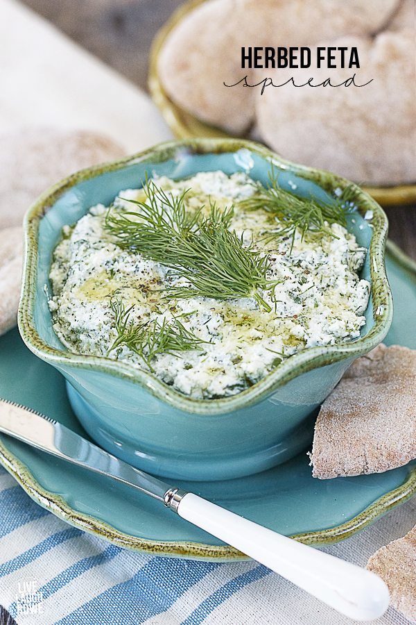 Delicious Herbed Feta Spread.  A perfect pairing with pita bread or crackers for an appetizer or snack!!  BONUS:  Serve with a glass of dry white wine! www.livelaughrowe.com