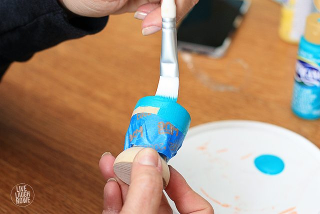 Tape and paint the wood egg cups.