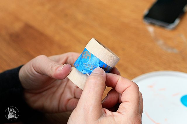 Tape and paint the wood egg cups.