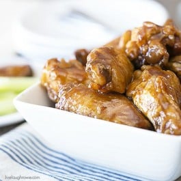 These BBQ Chicken Wings took my love for barbecue sauce to a whole new level! Made in the slow cooker, you'll have a snack or dinner ready in no time! livelaughrowe.com