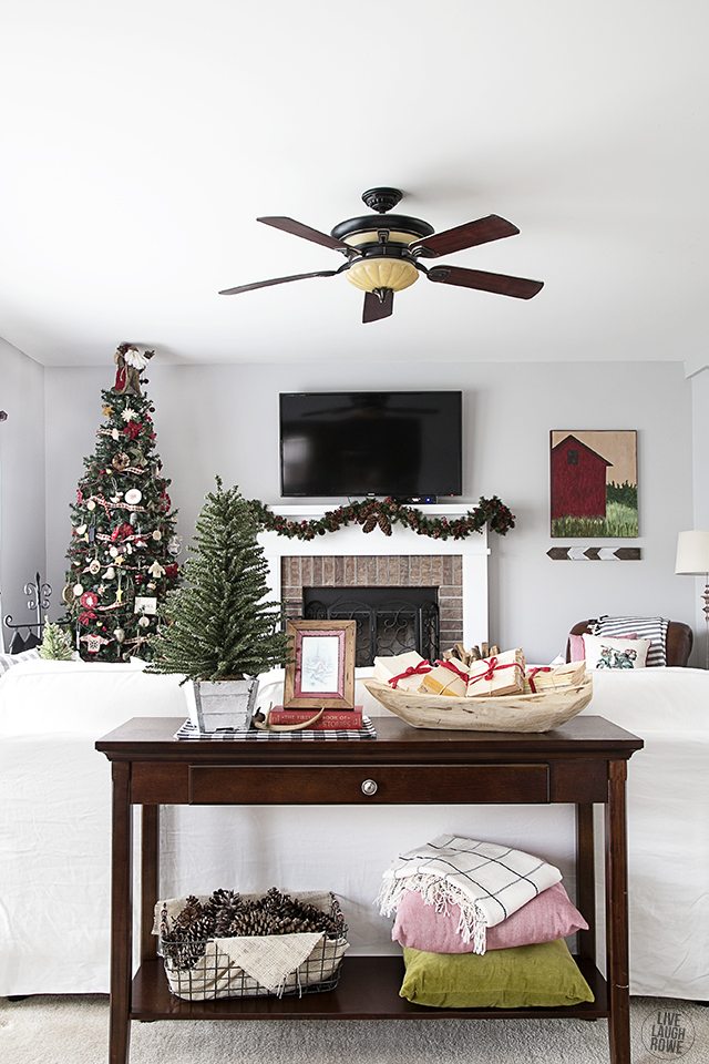Woodland Christmas Home Tour. I love how light and bright the space is with pops of holiday decor. livelaughrowe.com