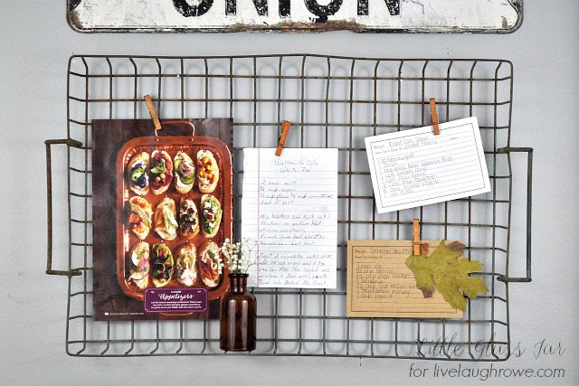 Hang a metal basket, add cothes pins to showcase memos or recipes! 