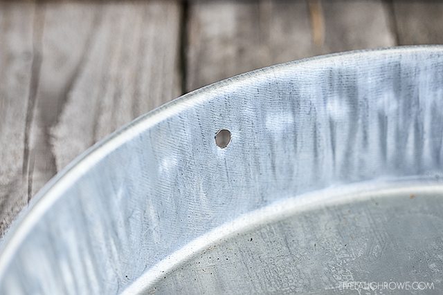 Drill holes into galvanized feeder. livelaughrowe.com