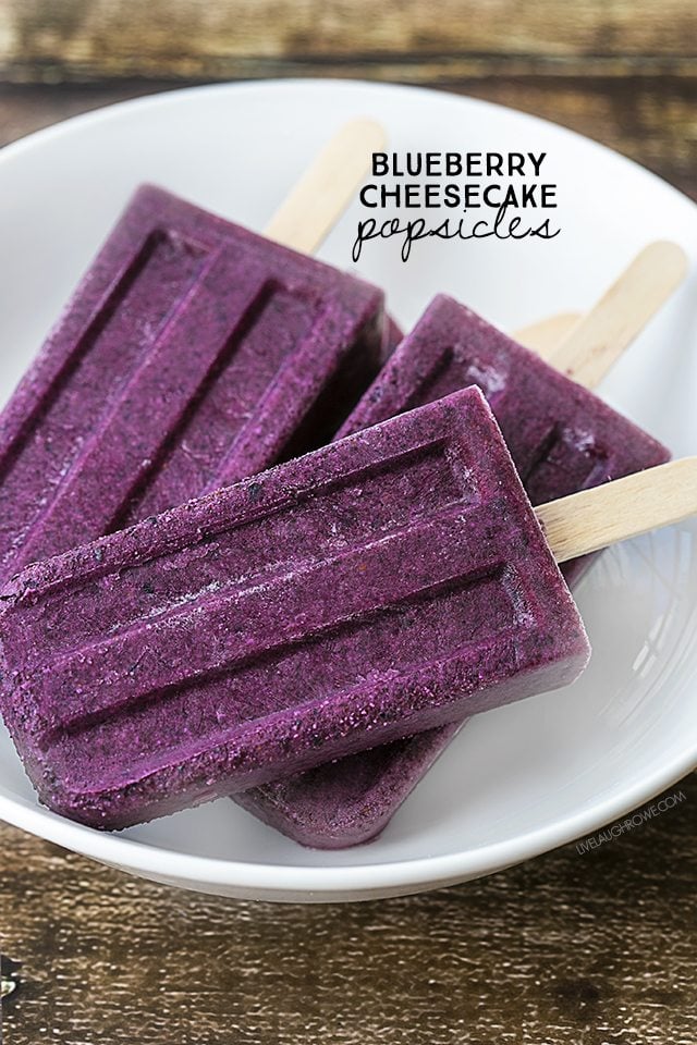 Blueberry Cheesecake Popsicles are the perfect icy treat on a stick for the blueberry lover. Fruit and dairy all in one too! livelaughrowe.com