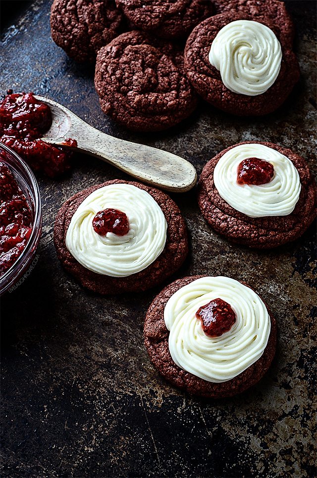 Delicious Red Velvet Cookies with Cream Cheese Frosting and Raspberry Jam. One just won't be enough (wink). livelaughrowe.com