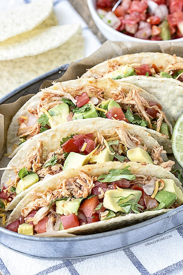 Turn ordinary chicken into flavorful tacos! These Easy Chicken Tacos are sure to be a new favorite for Taco Tuesdays. livelaughrowe.com