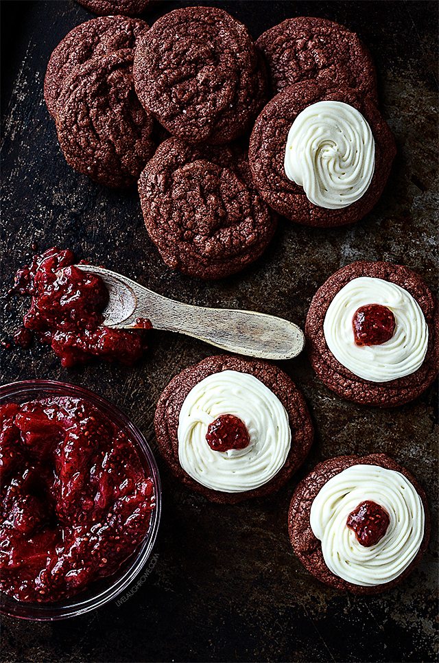 Delicious Red Velvet Cookies with Cream Cheese Frosting and Raspberry Jam. One just won't be enough (wink). livelaughrowe.com