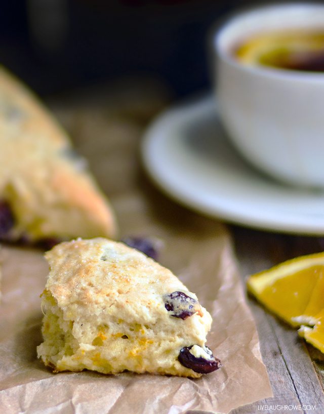 Paired with coffee or tea, these Orange Cranberry Scones are perfect for breakfast or an afternoon snack. livelaughrowe.com