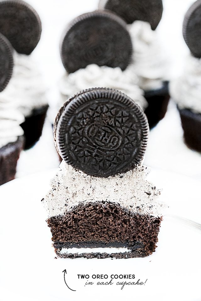These Oreo Cupcakes with Cookies and Cream Frosting will not disappoint -- each cupcake contains TWO Oreos. It's a chocolate lovers dream. livelaughrowe.com