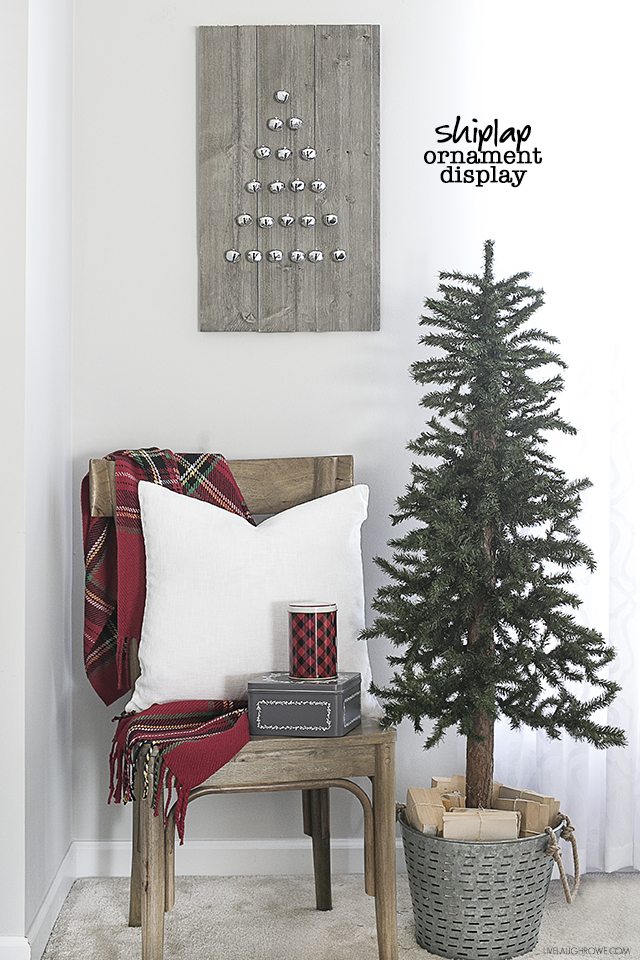 Step by step instructions on how to build a simple, rustic Shiplap Ornament Display. A great addition to your rustic, farmhouse holiday decor -- and you can change out the ornaments! livelaughrowe.com