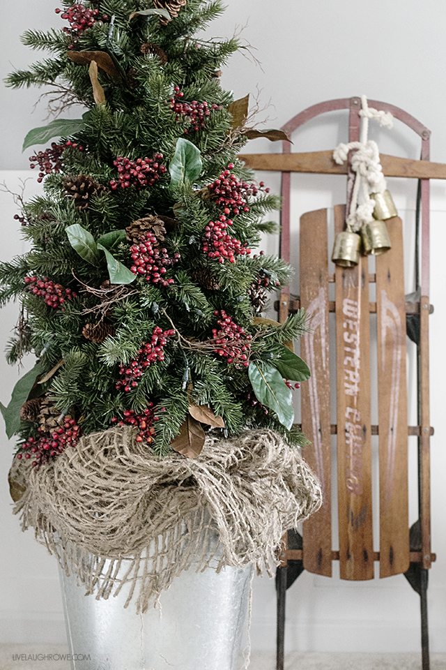 Beautiful vintage inspired Christmas Dining Room decor! Love the old sled! livelaughrowe.com