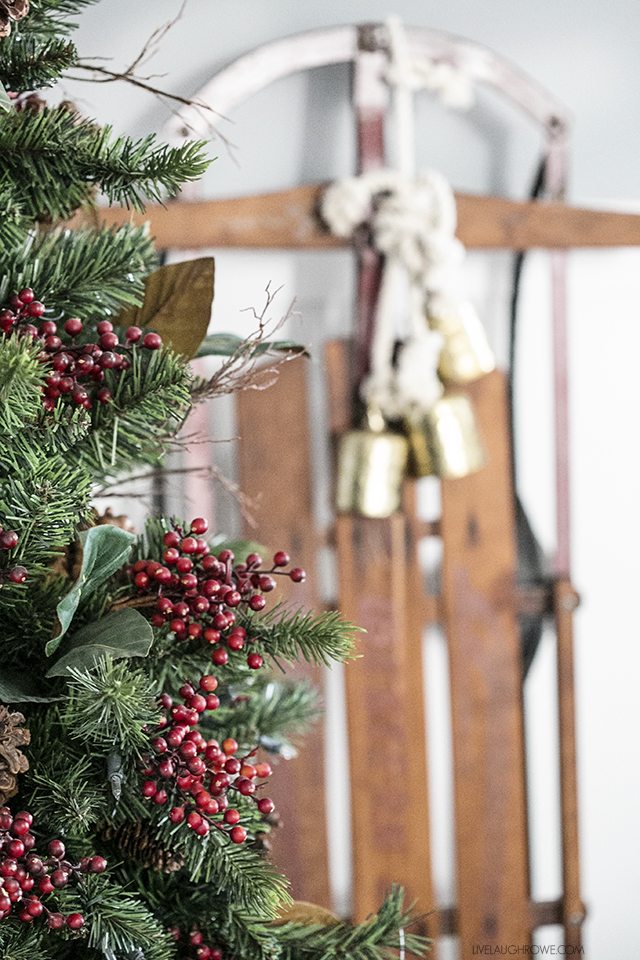 Beautiful vintage inspired Christmas Dining Room decor! Love the old sled! livelaughrowe.com