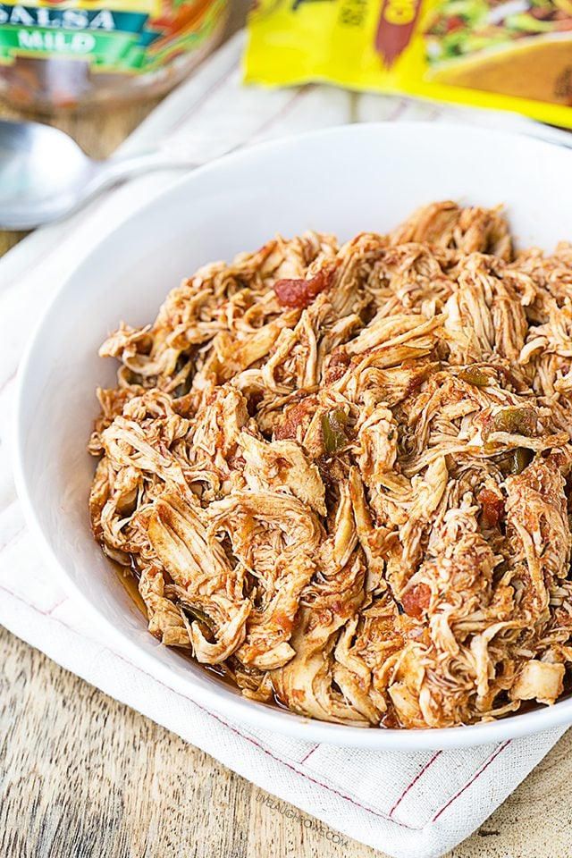 This Slow Cooker Salsa Chicken is not only easy to make, it's delicious on salads, sandwiches, tacos, wraps and more. Recipe at livelaughrowe.com