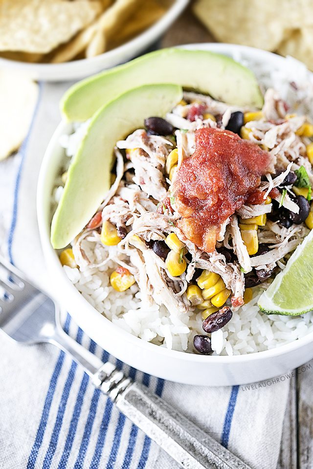 Simple Chicken Burrito Bowl made in the slow cooker. Easy and delicious? Yes, please! livelaughrowe.com
