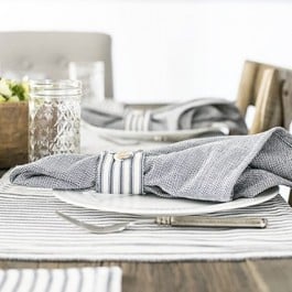 Loving these table linens -- blue ticking stripes? Swoon. livelaughrowe.com