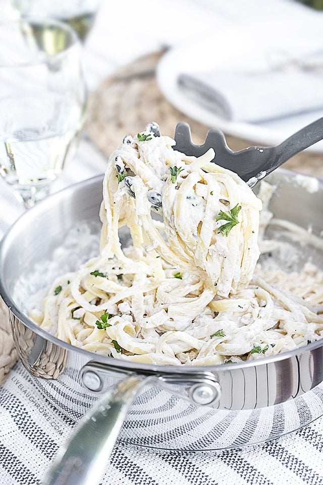 A delicious twist to your everyday fettuccine Alfredo! This Salmon Fettuccine is extraordinarily flavorful and can be made within 20 minutes. Recipe at livelaughrowe.com