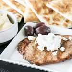 These greek pork chops are packed with flavor and are easy enough for a last-minute dinner! Serve with your favorite greek toppings and greek pita bread. livelaughrowe.com