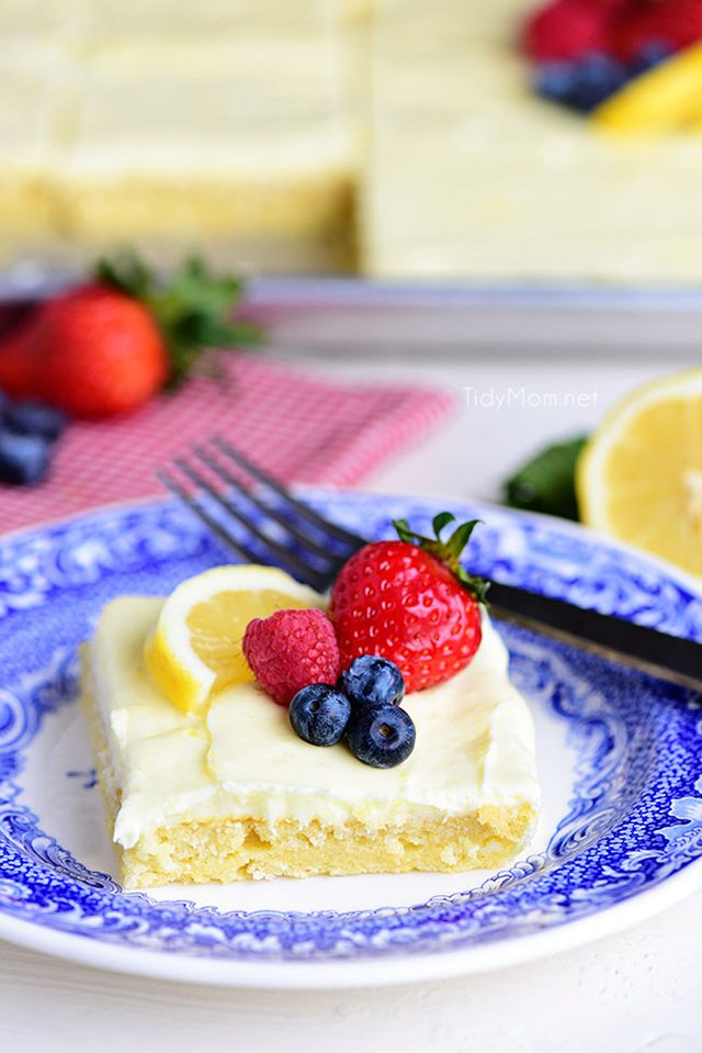This no-fuss lemon sheet cake is super moist and makes a wonderful spring or summer dessert that easily feeds a crowd. It may not be a fancy cake, but each slice is pure lemon bliss!