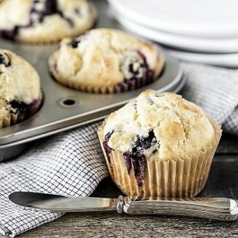 Delicious Blueberry Muffins that aren't too sweet -- a perfect treat to pair with a cup of coffee or tea. livelaughrowe.com