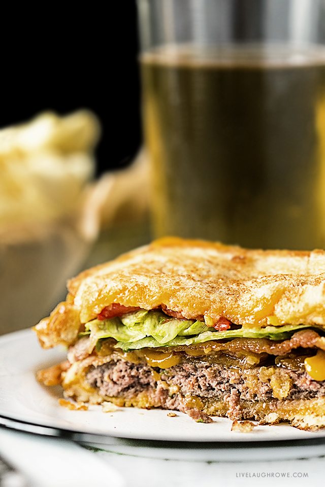 This Grilled Cheese Bacon Burger from livelaughrowe.com looks to be packed with some of my favorites. One flavorful burger coming right up.