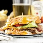 This Grilled Cheese Bacon Burger from livelaughrowe.com looks to be packed with some of my favorites. One flavorful burger coming right up.