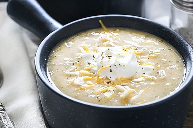 This White Chicken Chili Recipe is sure to warm you up this winter -- a hearty dish that is packed with flavor! Recipe at livelaughrowe.com