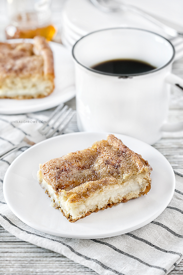 This Sopapilla Cheesecake Recipe will be your new go-to dessert for all the upcoming potlucks! It's rich, creamy and filling. Recipe at livelaughrowe.com