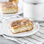 This Sopapilla Cheesecake Recipe will be your new go-to dessert for all the upcoming potlucks! It's rich, creamy and filling. Recipe at livelaughrowe.com