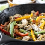 Ever wonder How to Make Chicken Fajitas in a Cast Iron Skillet? Yep, one skillet does it all in less than 30 minutes with this easy fajita recipe. Learn more at livelaughrowe.com