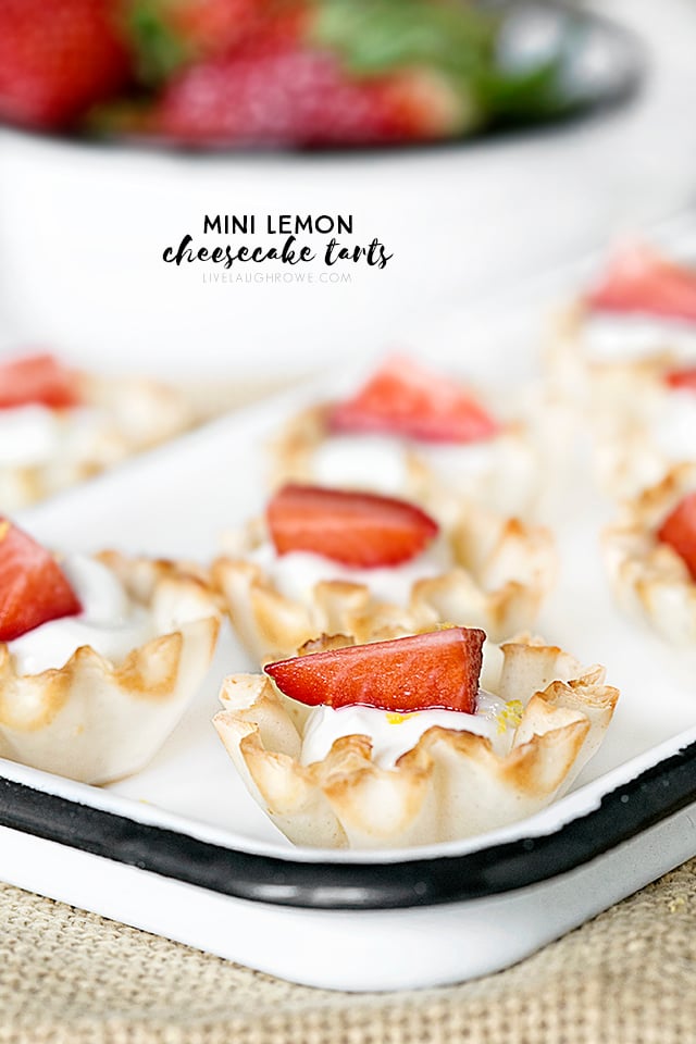 Lemon, cheese and berries make a delicious trio. These bite-size Lemon Cheesecake Tarts are guilt free way to satisfy your sweet tooth. Did I mention this is a Weight Watchers dessert with only one point per tart. Recipe at livelaughrowe.com
