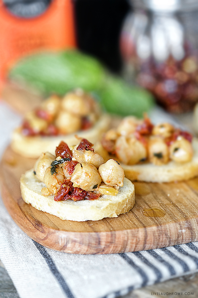 Savory Chickpea Crostini with Sun-Dried Tomatoes and Mint. This recipe makes a delicious snack or appetizer. Recipe at livelaughrowe.com