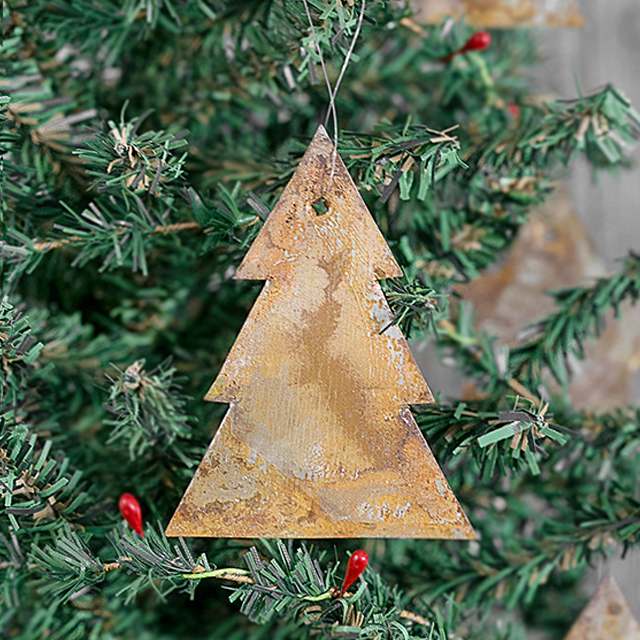 DIY Rusty Metal Ornaments. If you love the rusty, chippy look -- these ornaments will be a perfect addition to your Christmas decor (and tree)! Full tutorial at livelaughrowe.com