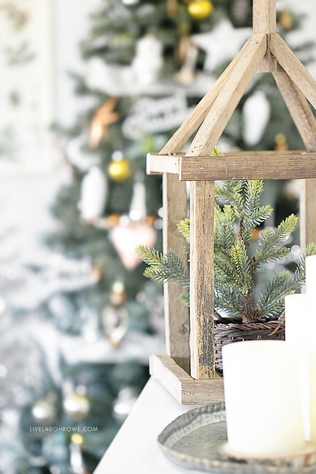 This pallet wood framed lantern is BEAUTIFUL! Silver and Gold Christmas Tree is lovely too. livelaughrowe.com