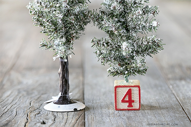 Turn the base of a bottle brush or sisal tree from drab to fab with this simple Christmas Tree Craft inspiration. Learn more at livelaughrowe.com
