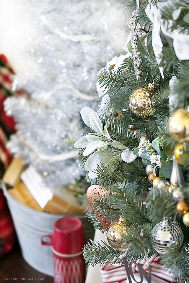 Beautiful Silver and Gold Christmas Tree. Love seeing the old pieces paired with some new, shiny pieces. livelaughrowe.com